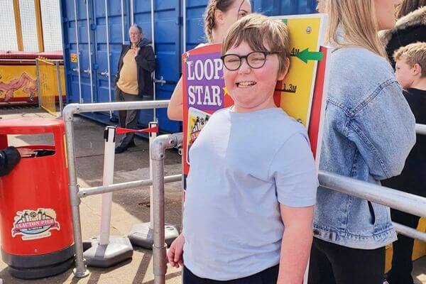 Amy's son, Leon smiling happily.