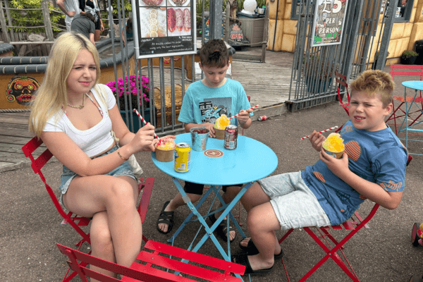 A photo of Jenny's children enjoying ice-cream.