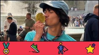 Man kissing a medal that he has won