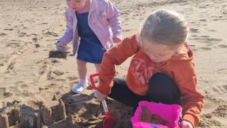 kids playing in sand