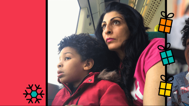 Sabina and her son, Dion looking out the train window.