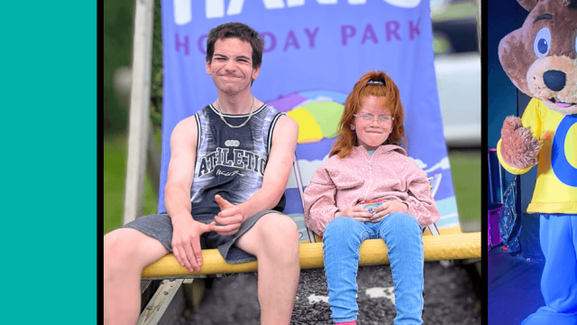 Tania's son and daughter sitting on a holiday park chair together laughing happily.